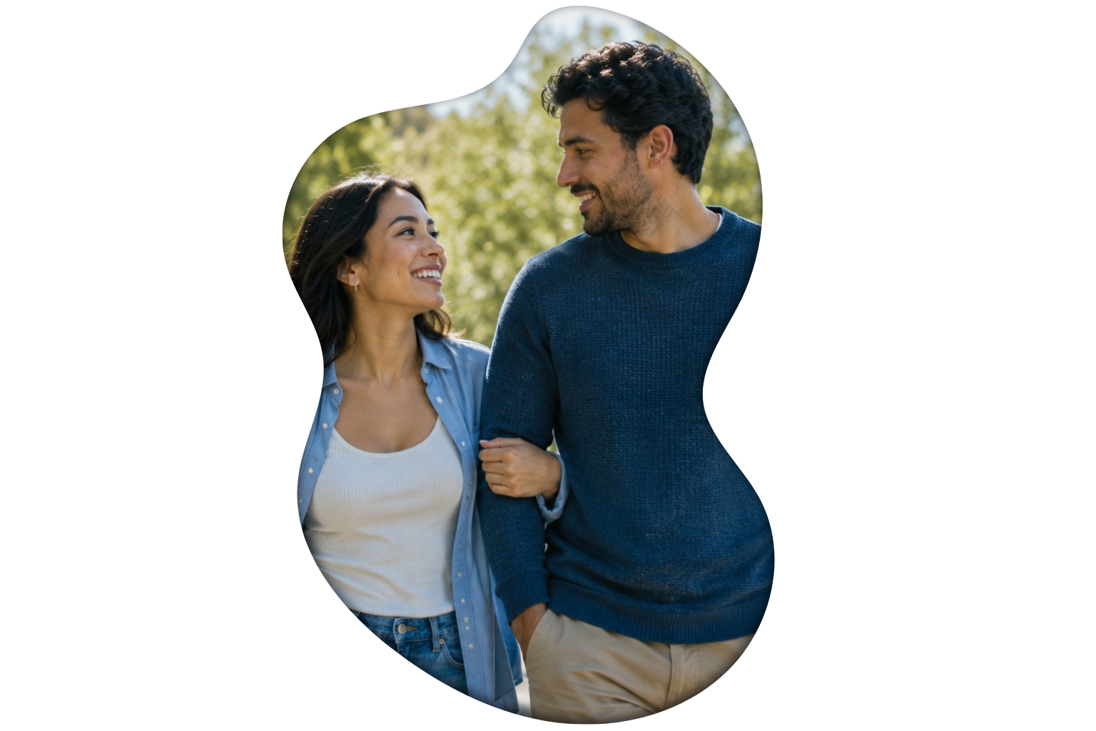 Image: Couple enjoying a relaxed conversation while walking through a peaceful park